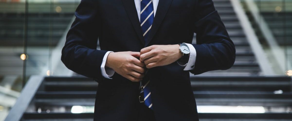 man in a black suit